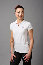 Polo donna 100%cotone bianca con ricamino nero lato cuore