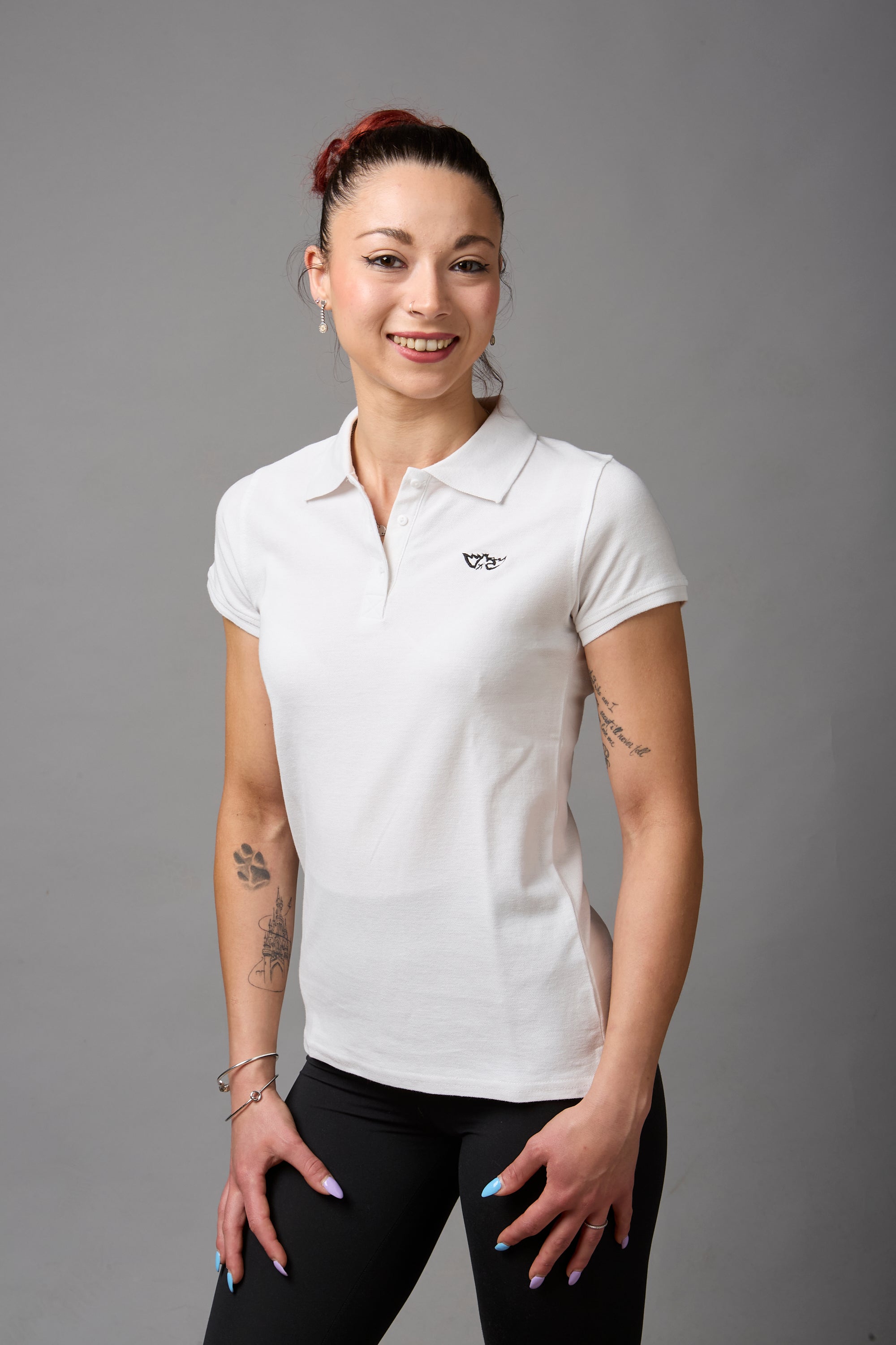 Polo donna 100%cotone bianca con ricamino nero lato cuore